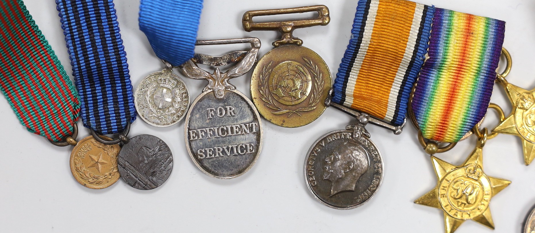 A group of British and Italian military miniature medals